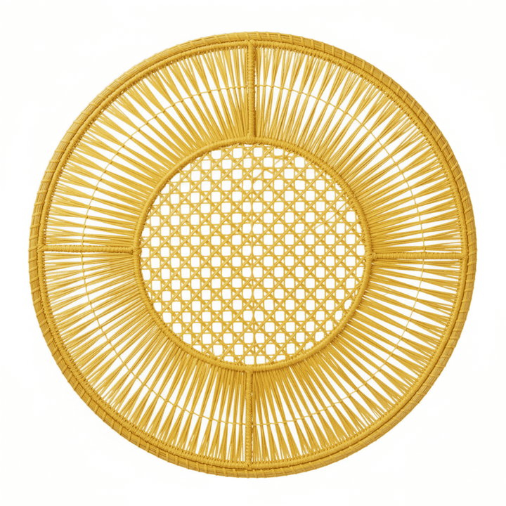 Round handwoven iraca placemat in light tan with openwork lattice center and spokes