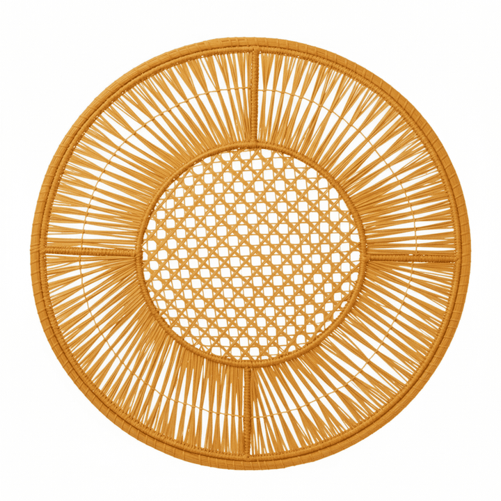 Round handwoven iraca placemat in sage green with open lattice center and woven spokes