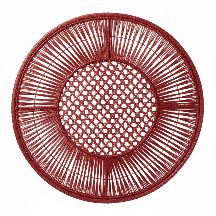 Round handwoven iraca placemat in blush pink with openwork lattice center