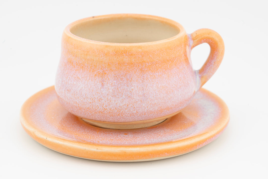 Ceramic espresso cup and saucer set, peach-pink speckled glaze