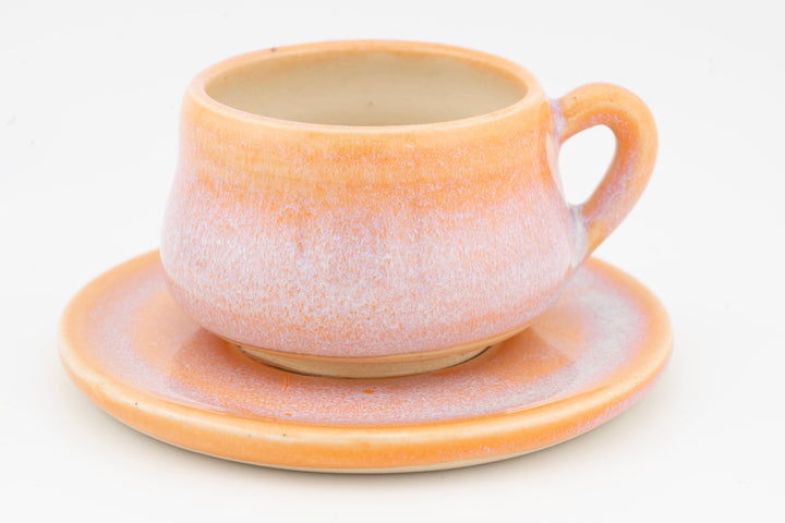 Ceramic espresso cup and saucer set, peach-pink speckled glaze