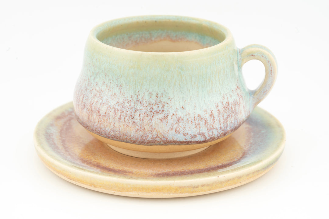 Ceramic espresso cup and saucer set, mint green glaze with pink speckling