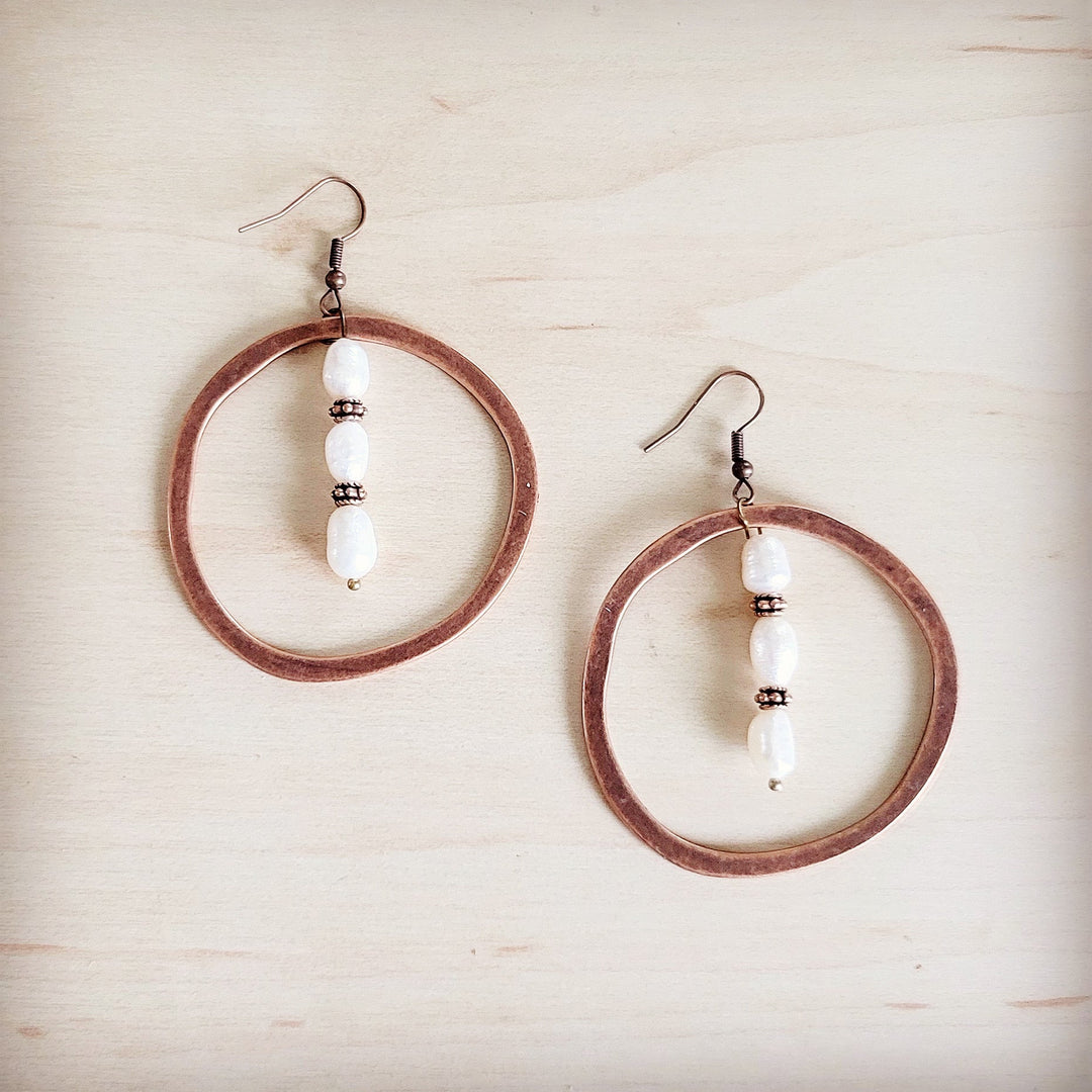 Copper hoop earrings with freshwater pearl drops and beaded accents