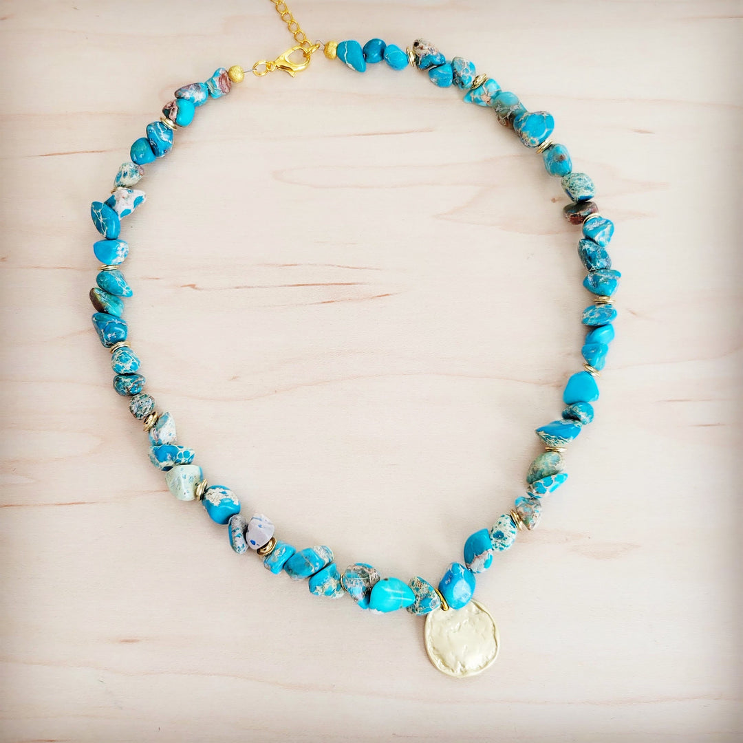 Turquoise beaded collar necklace with round gold coin charm and mixed-texture bead accents