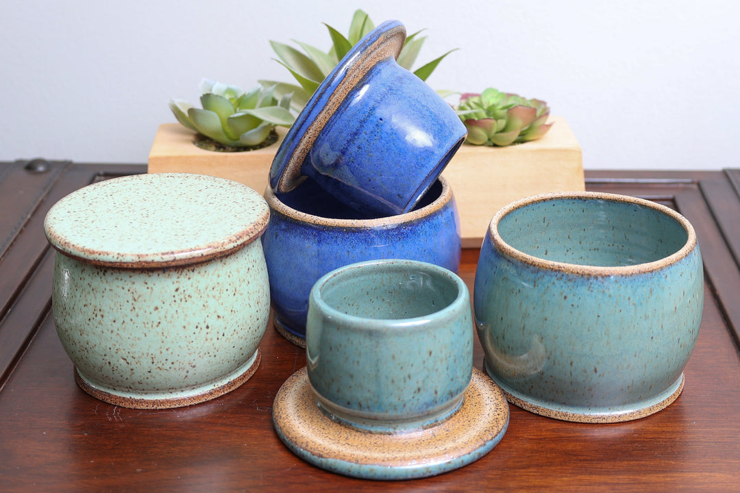 Ceramic butter dish set with two cups and a lid, blue and turquoise speckled