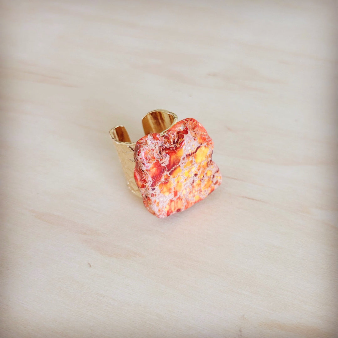 Orange marbled resin statement ring with gold-tone open band
