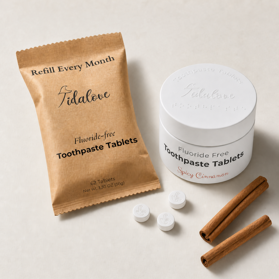 Fluoride-free toothpaste tablets tin and refill pouch with tablets and cinnamon sticks