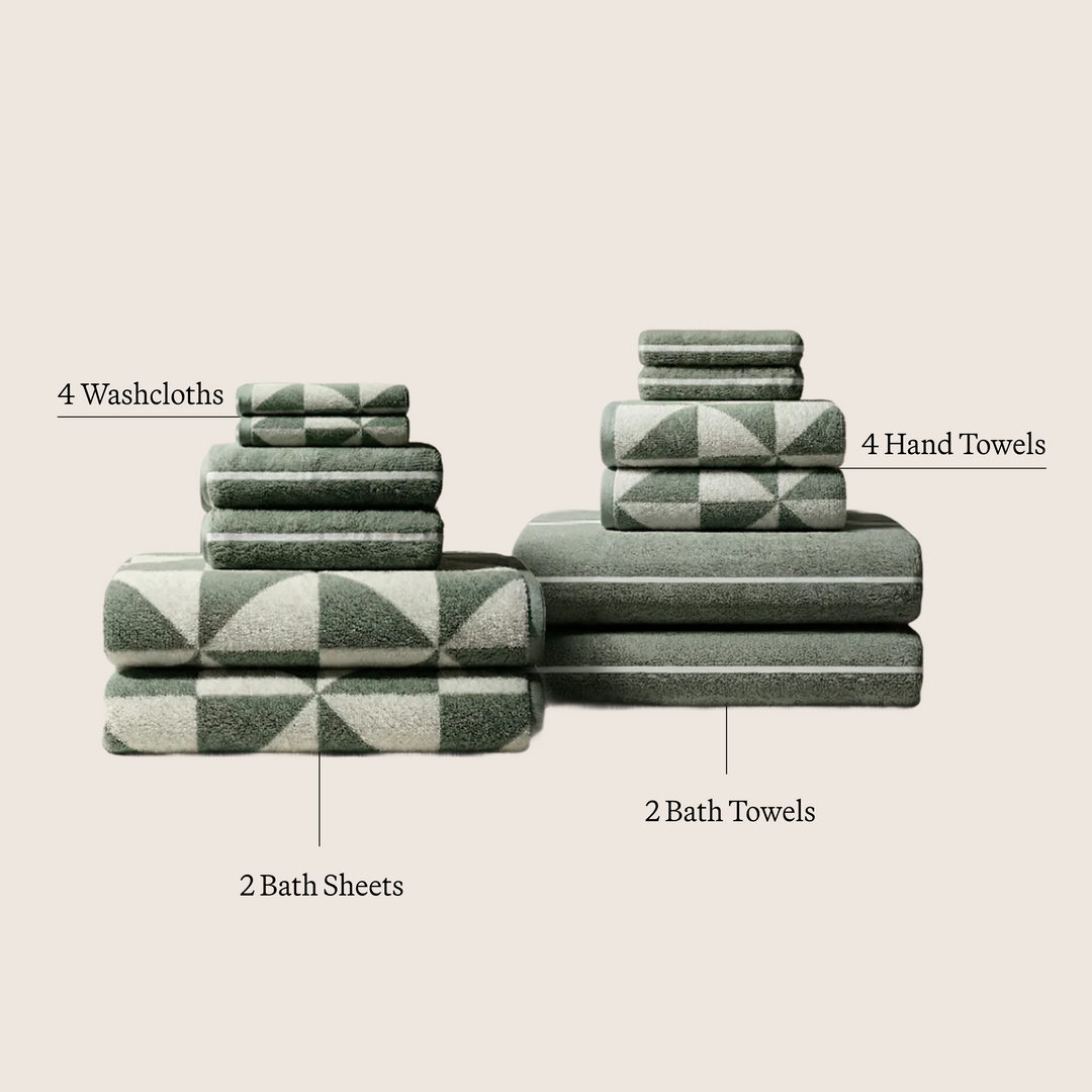 Sage-green cotton towel set layout with white geometric pattern stacks