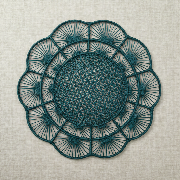 Handwoven iraca placemat with dark brown center and light petals, brown woven edge