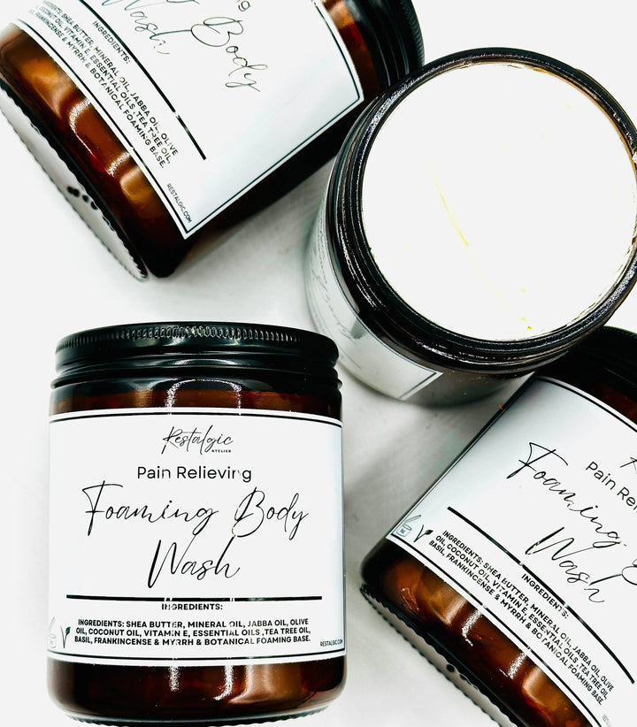 Foaming body wash set with amber jars, labels, and open white product lid