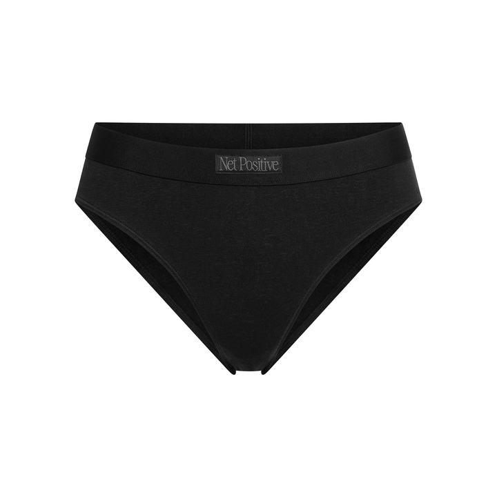 Net Positive black mid-rise brief, flat lay showing waistband and front seam.