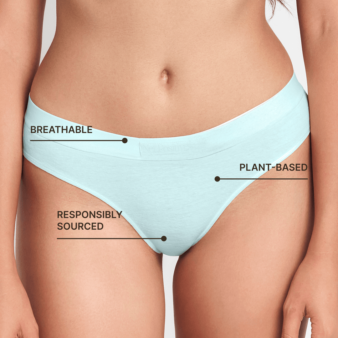 Light blue mid-rise briefs closeup with high-cut legs on model