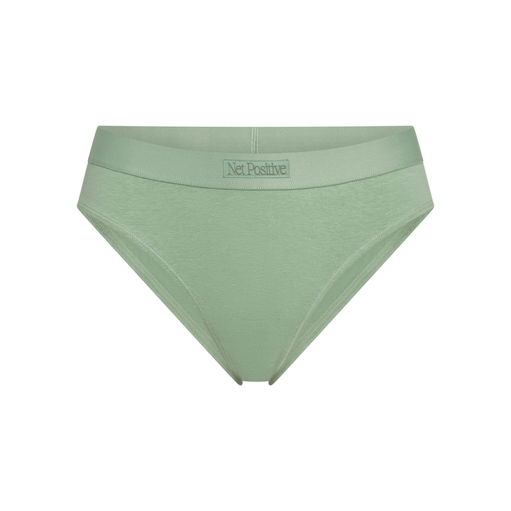 Sage green mid-rise briefs, flat lay with “Net Positive” waistband label