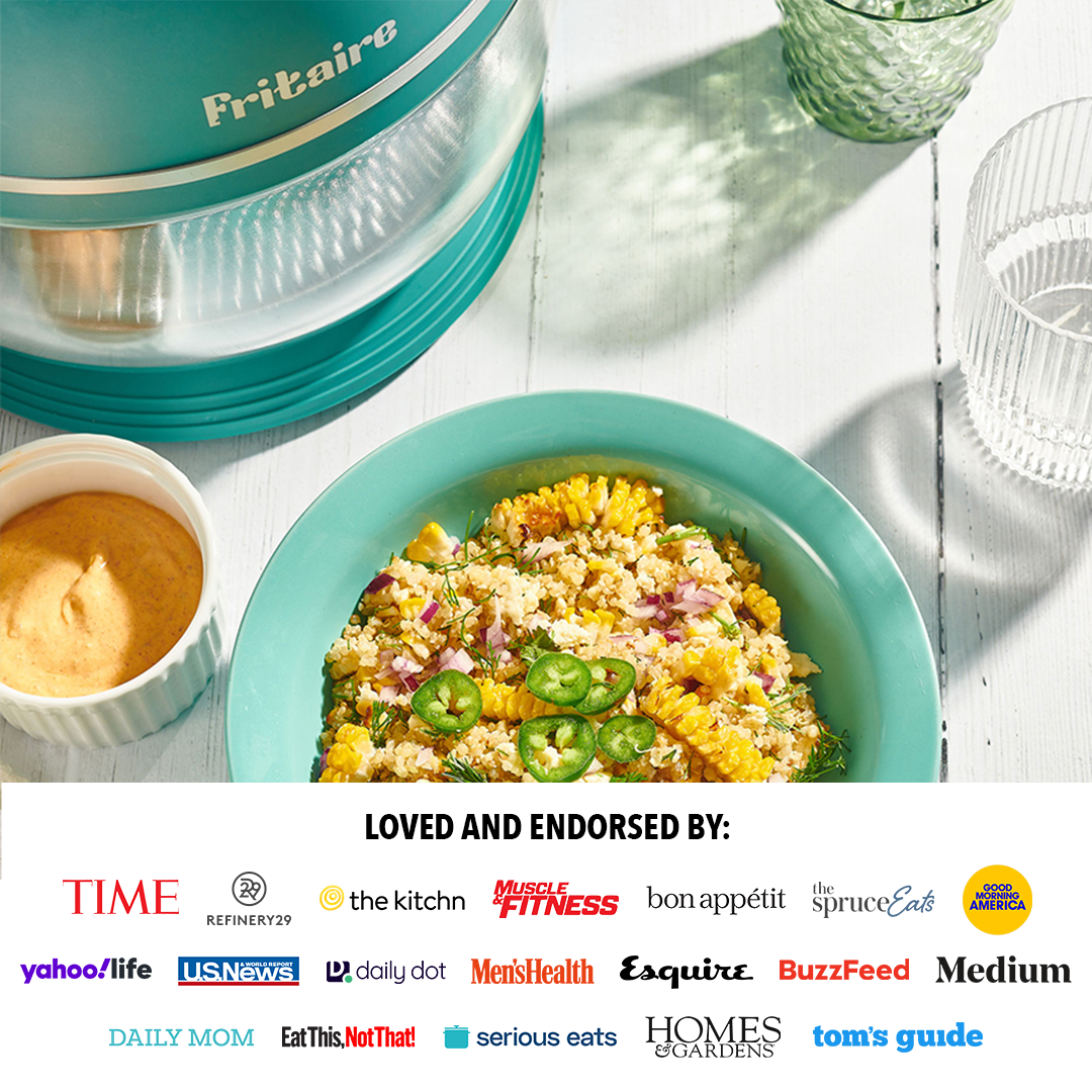 Teal air fryer with clear glass bowl and ingredient bowls for cooking