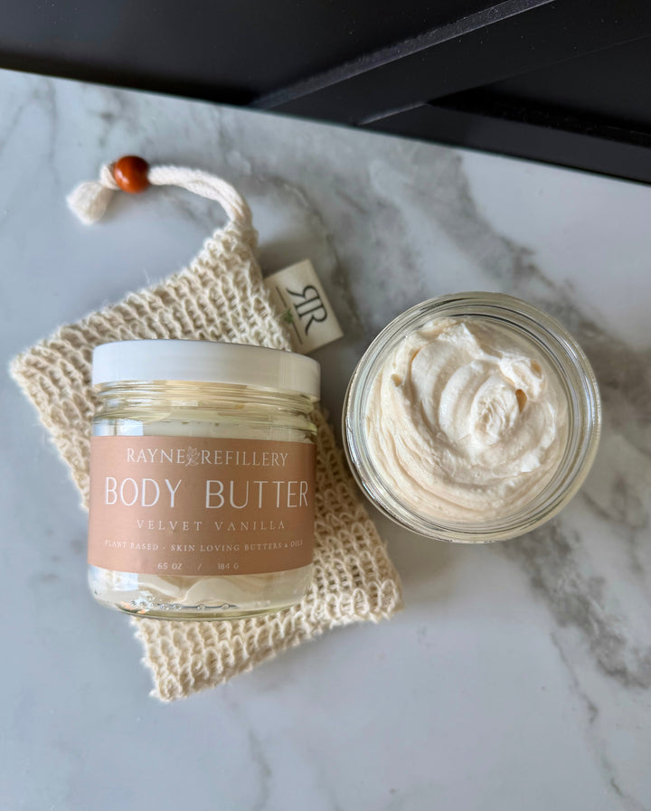 Body butter jar with creamy swirl, velvet vanilla label on beige jar