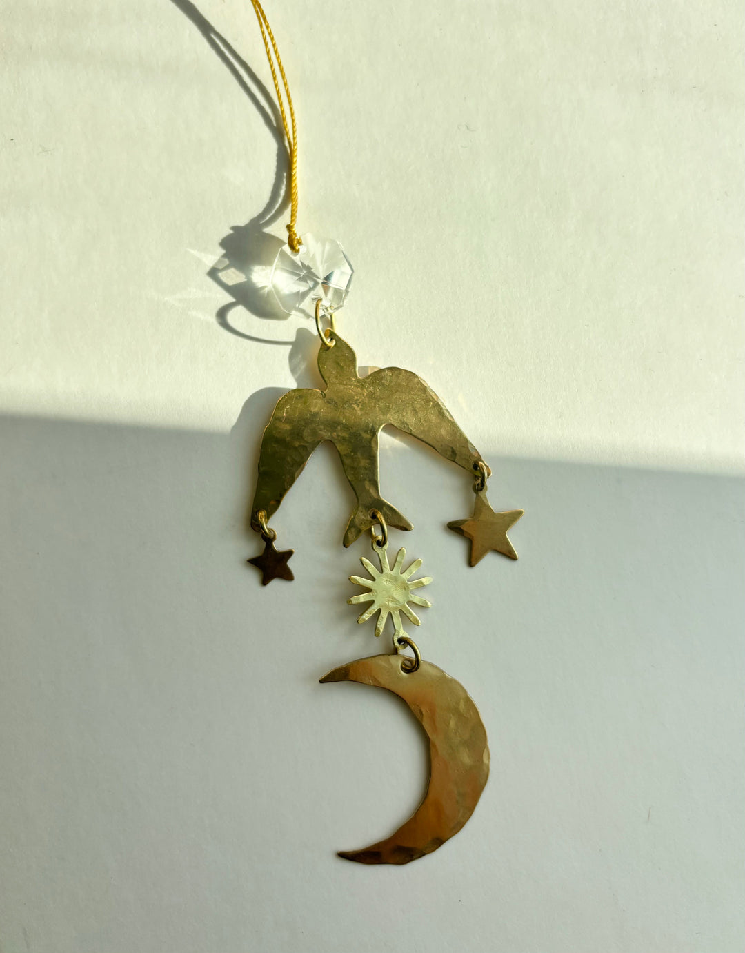 Hanging moon and star ornament with sunburst crystal charm and gold loop