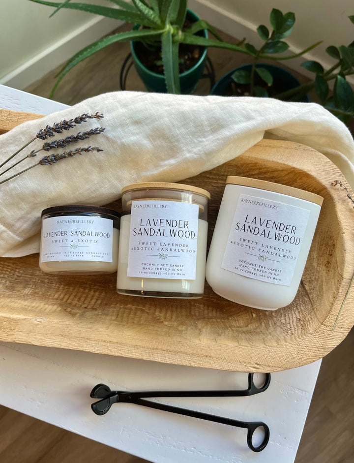 Lavender sandalwood candles set: three white jars with black wick trimmer on tray