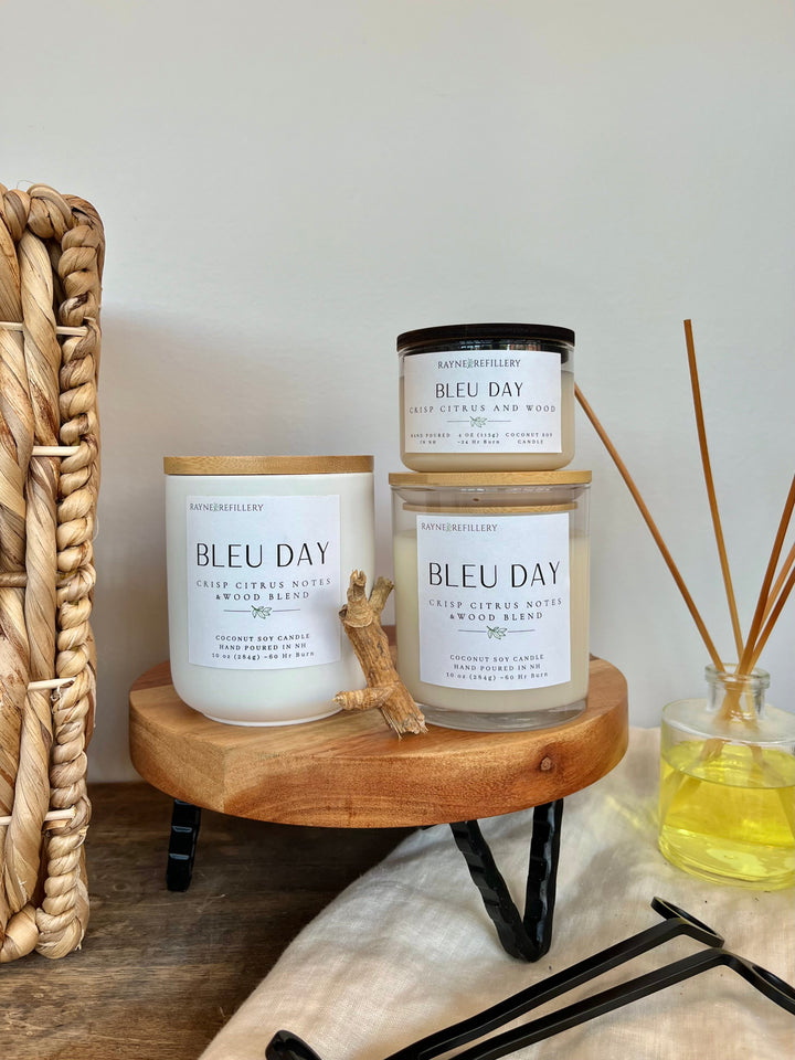 Coconut soy candle set in white glass jars on wooden tray, with wicks centered
