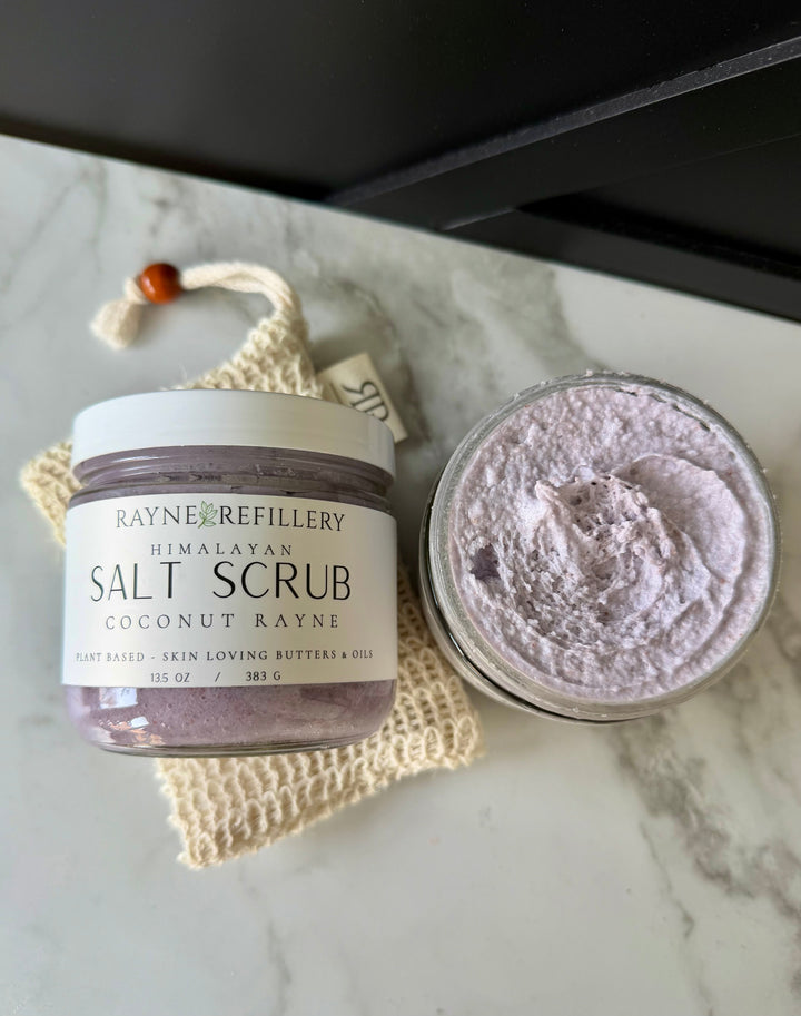 Whipped pink Himalayan salt scrub jar with open lid and purple scrub