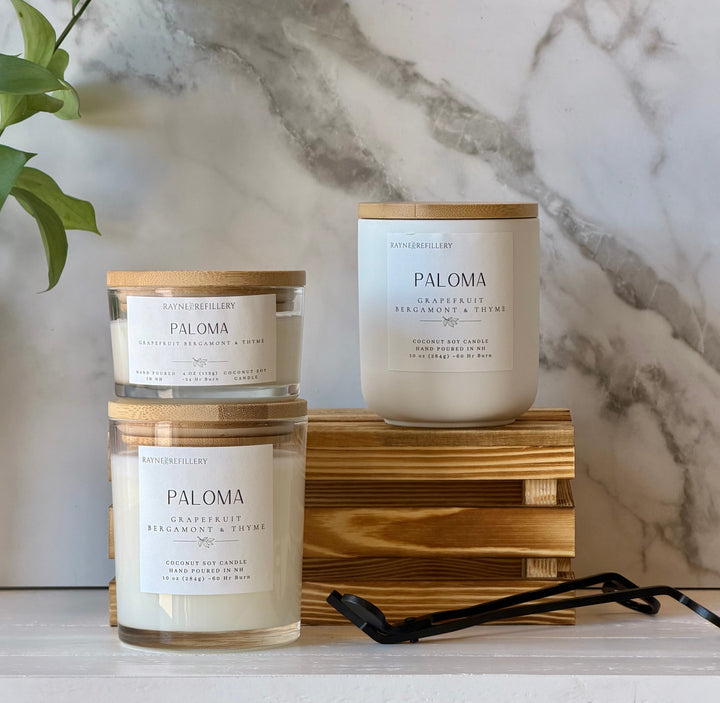 Coconut soy candle in white glass jar with wood lid; label shows grapefruit, bergamot & thyme