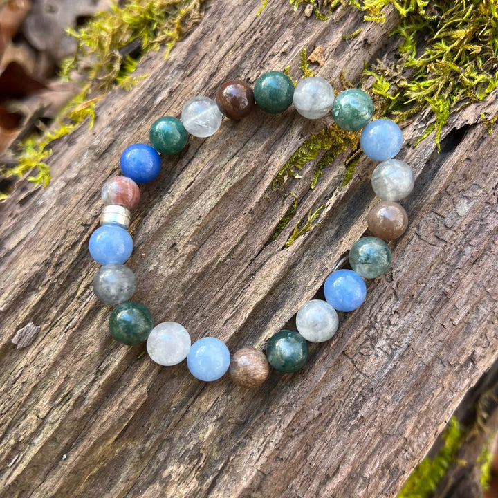 Beaded stretch bracelet with blue, green, white, and brown stone beads