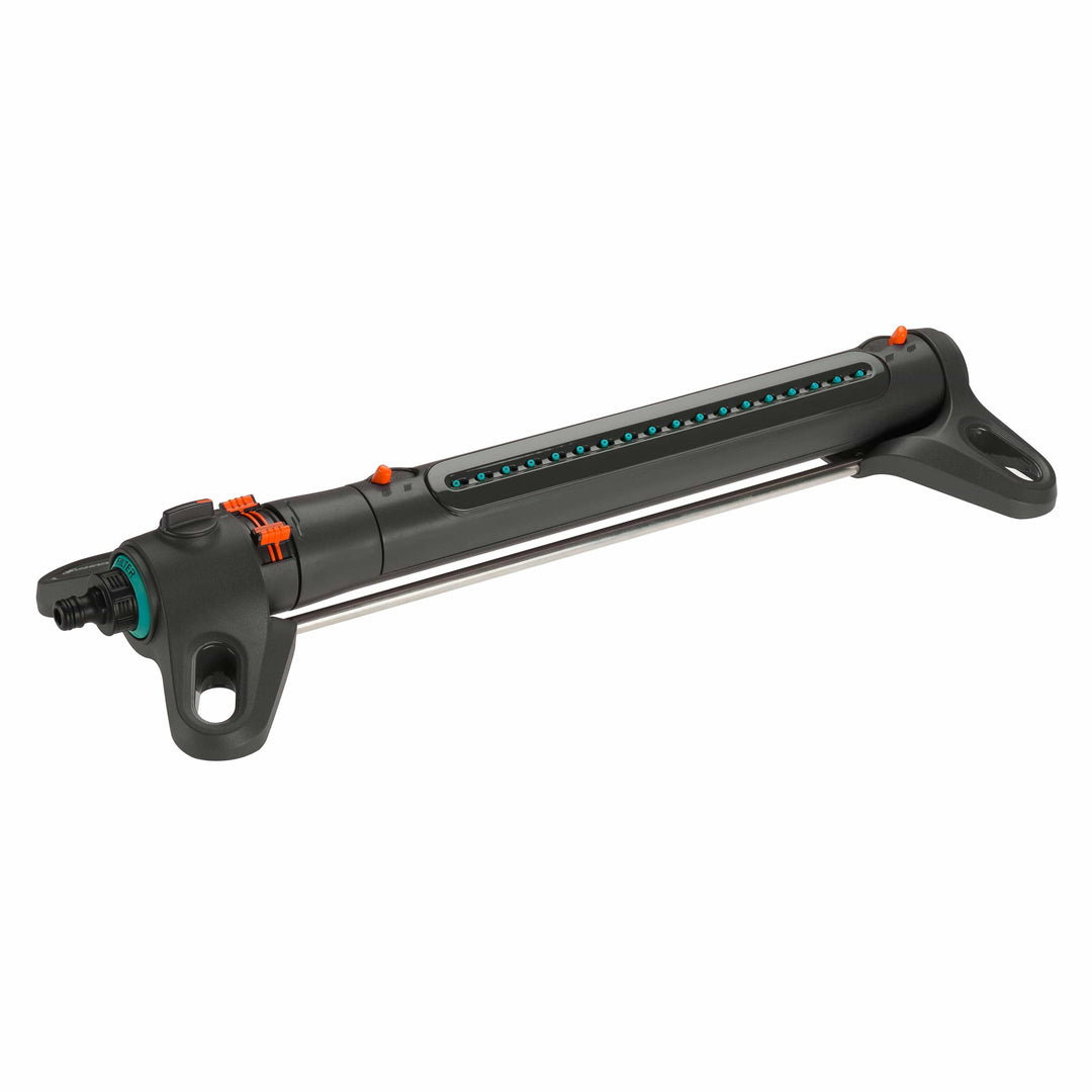 Oscillating garden sprinkler with black handle and orange control accents