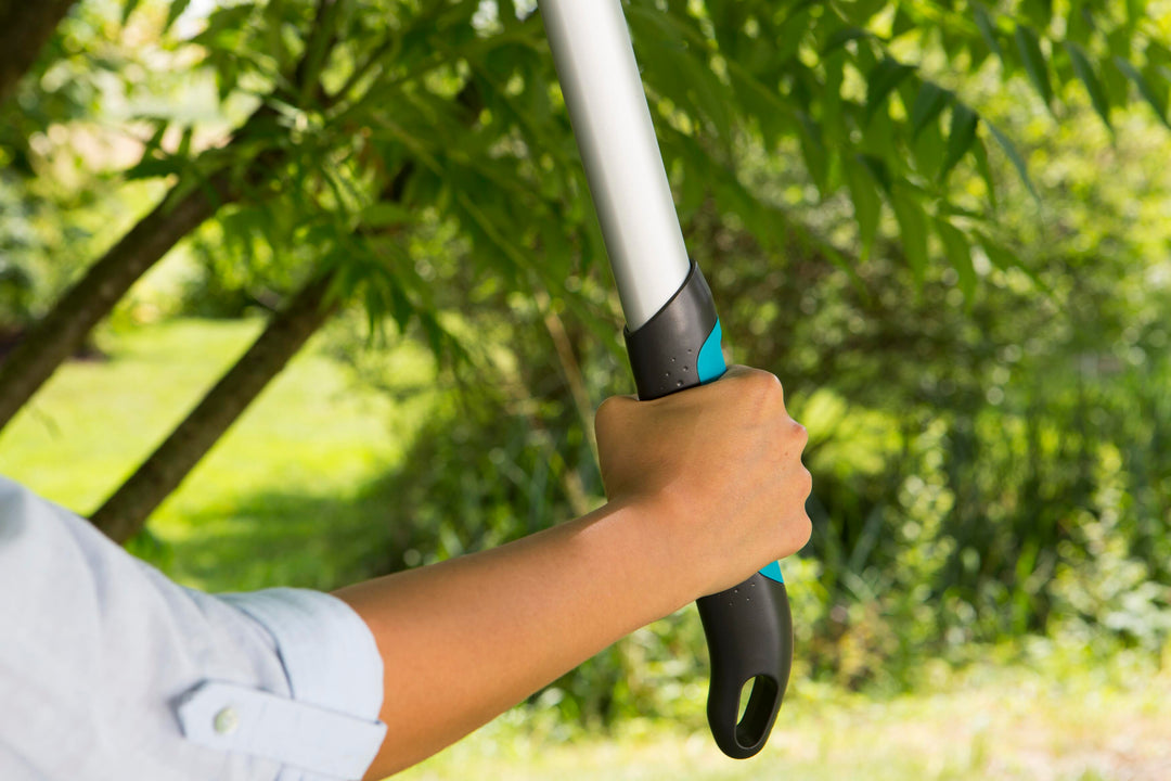 Pruning lopper handle grip in teal and black with silver shaft