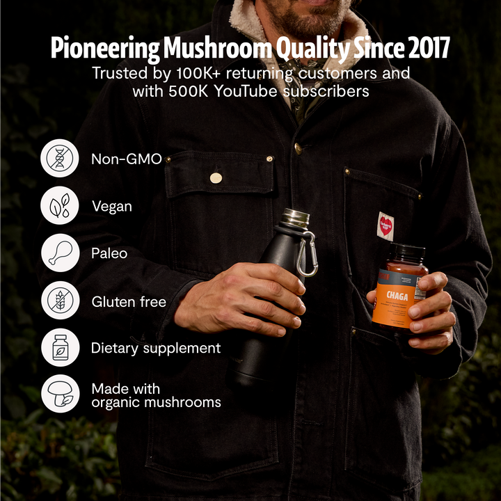 Man holding FreshCap chaga capsules bottle, with vegan, gluten-free icons
