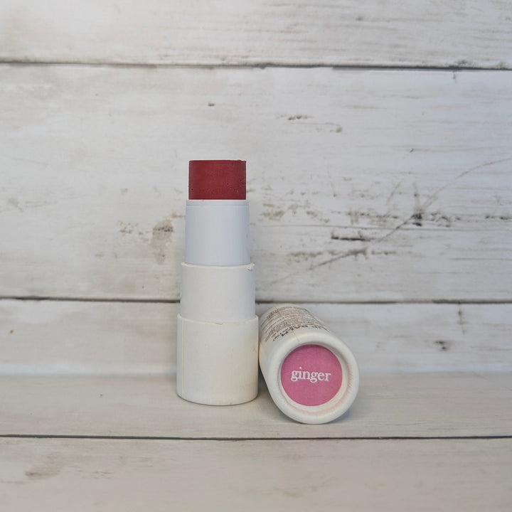 2-in-1 lip and cheek tint lipstick in Ginger, white tube with brown cap and open pan