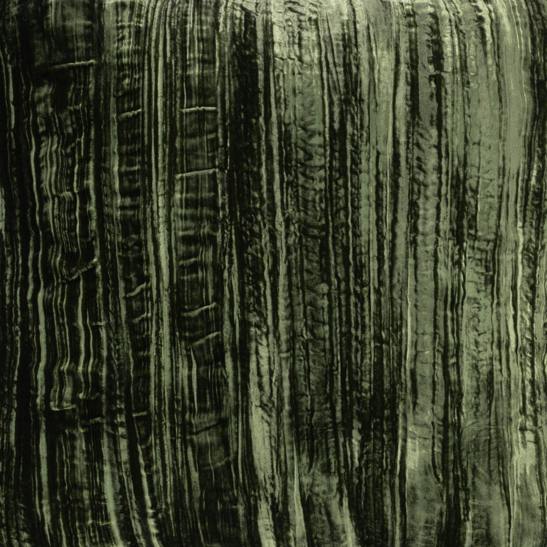 Green silk velvet pillow fabric close-up with vertical ribbed texture, no fringe.