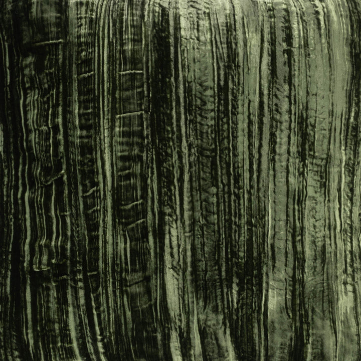 Green silk velvet pillow fabric close-up with vertical ribbed texture, no fringe.