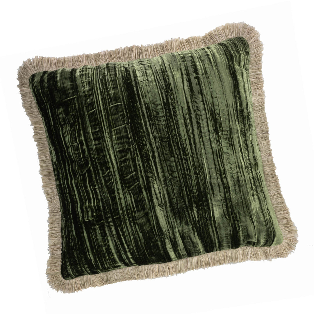 Square green velvet pillow with beige fringe trim along the edges, 20" x 20".