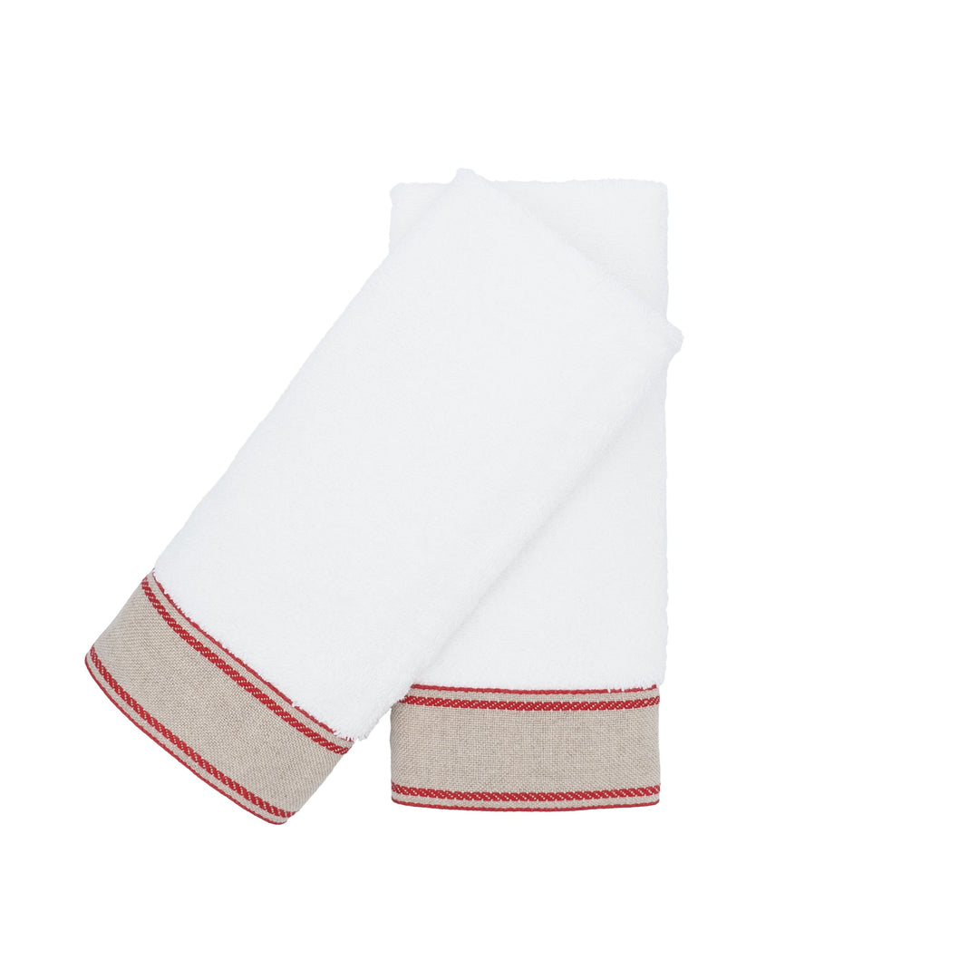 White guest towel pair with red chain-style striped border, laid flat