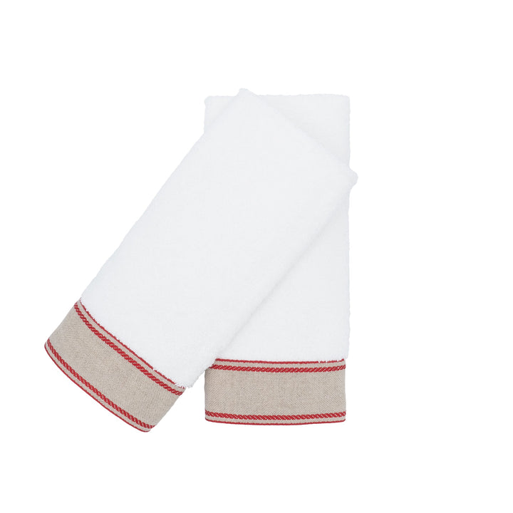 White guest towel pair with red chain-style striped border, laid flat