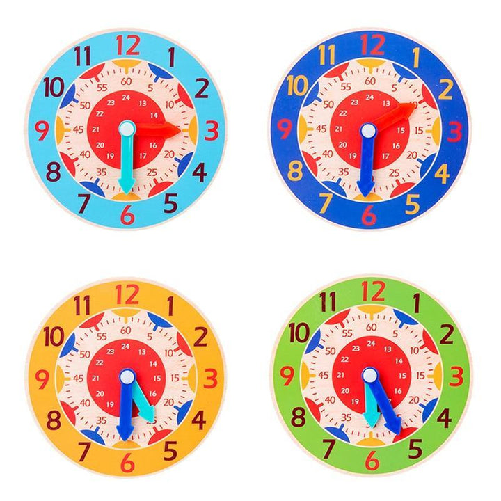 Set of four colorful children’s wooden clock toys with different hand positions