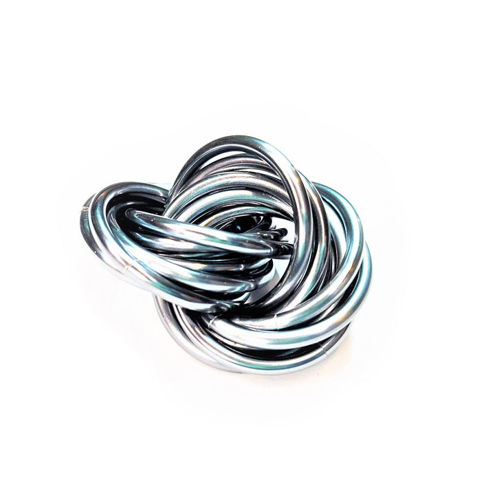 Swirled metallic fidget stress ball, black and silver loops with subtle blue sheen