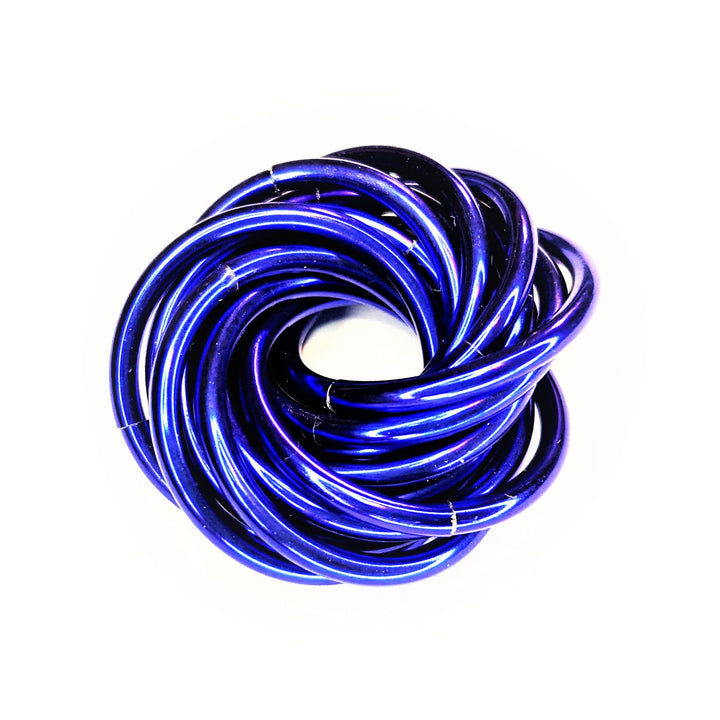 Swirled fidget stress ball, deep blue glossy loops in a rounded knot shape