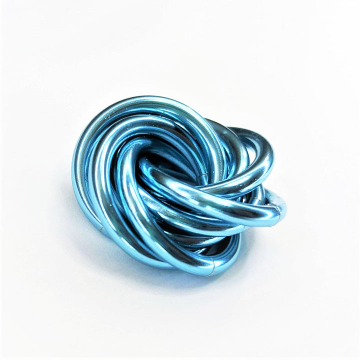 Metallic light blue twisted stress ball fidget toy, coiled rings shape