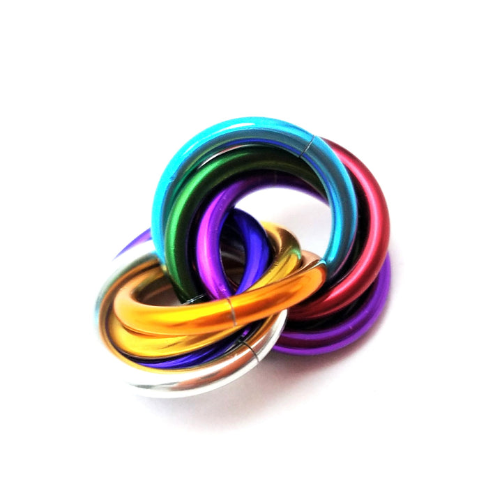 Shiny multicolor ring fidget stress ball, rainbow rings looped into a compact circle