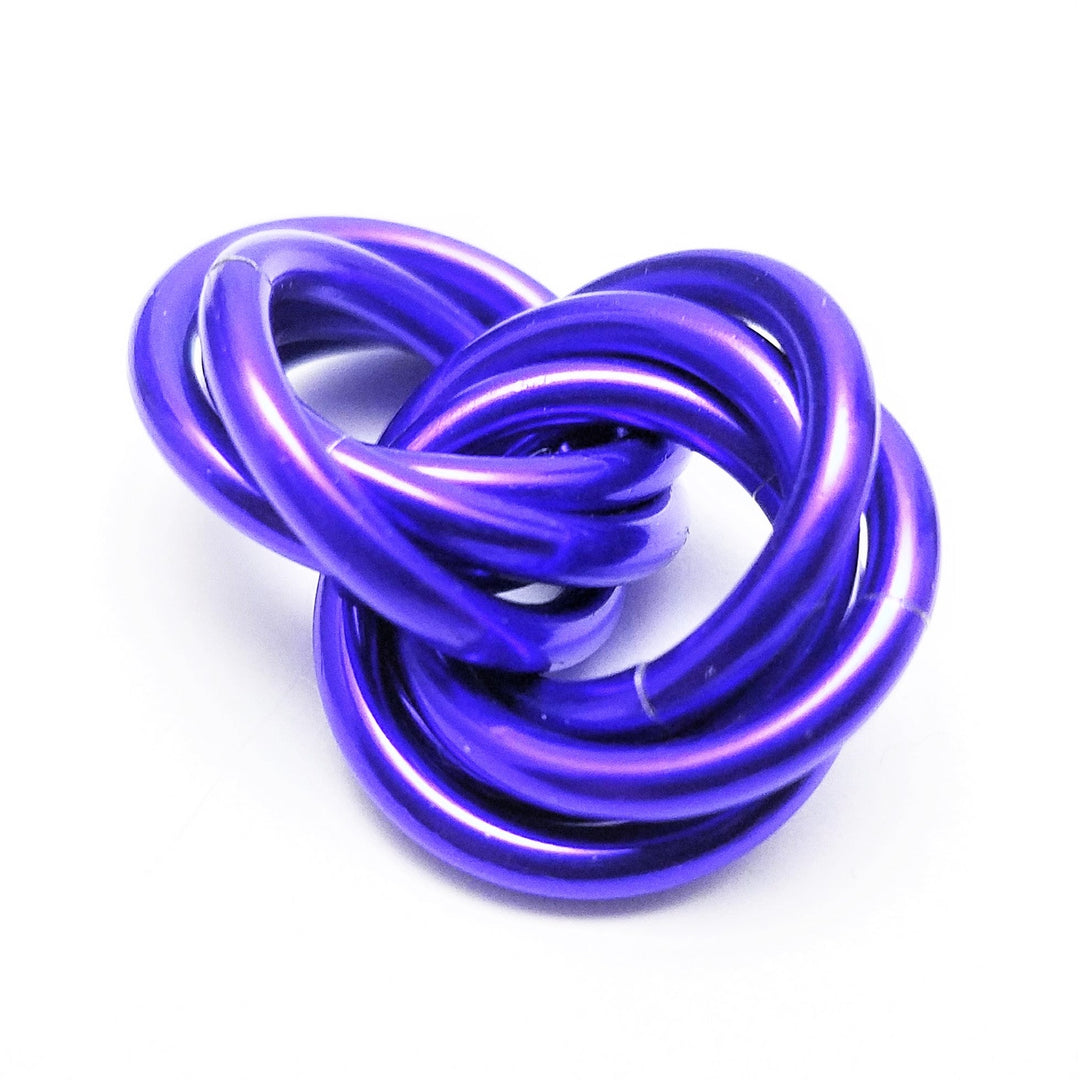 Purple metallic stress fidget ball with coiled loop design
