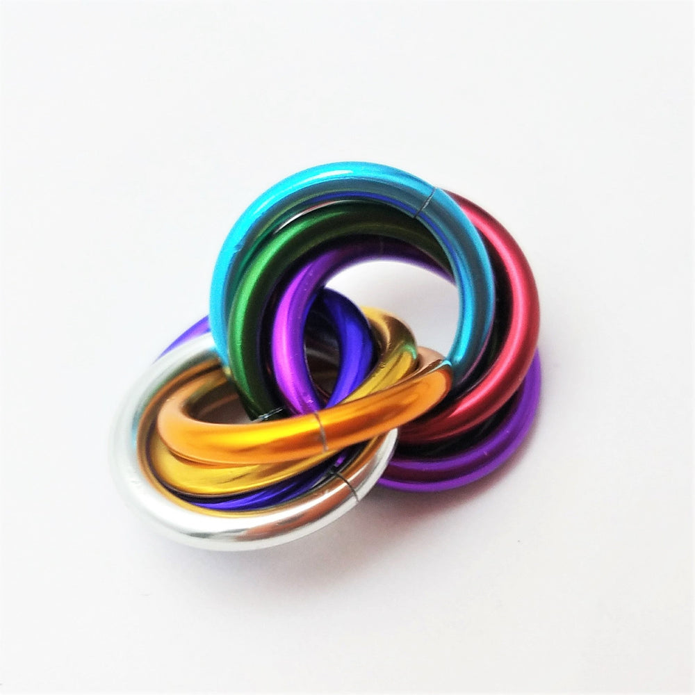 Multicolor metal fidget ball with braided loops, rainbow blue green purple and gold
