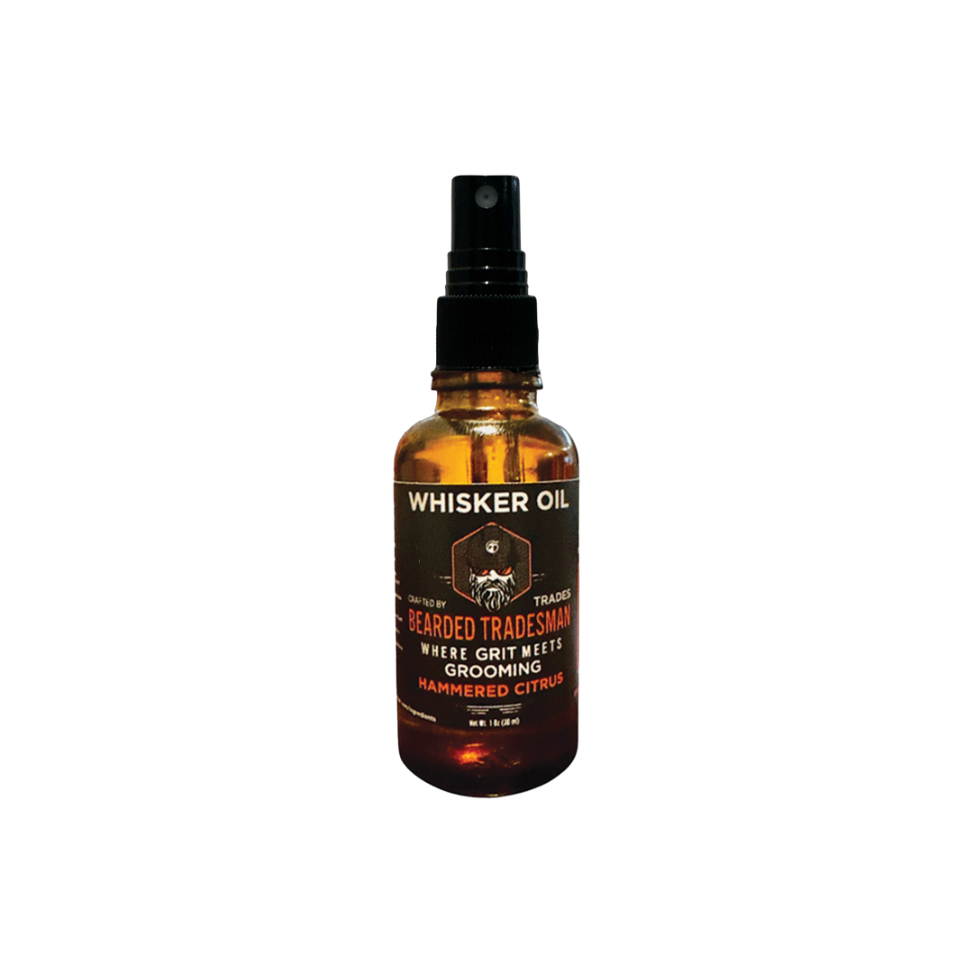Whisker oil bottle with amber liquid, black spray pump, and WHISKER OIL label