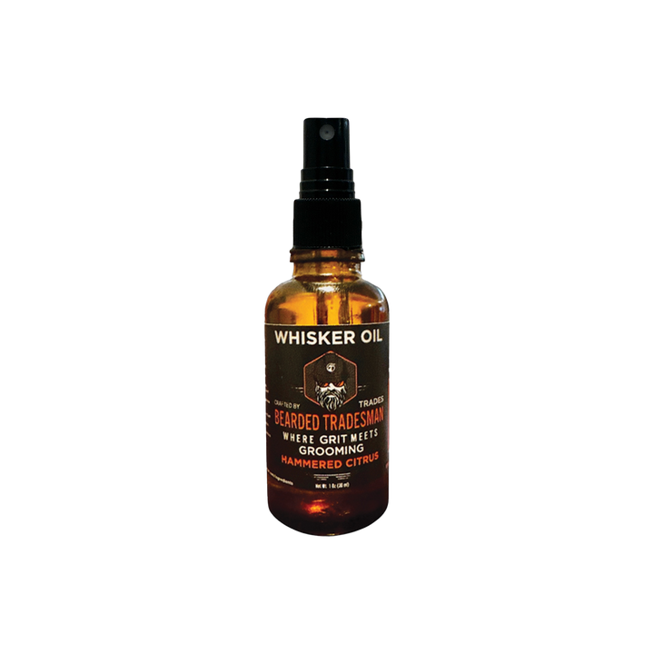 Whisker oil bottle with amber liquid, black spray pump, and WHISKER OIL label
