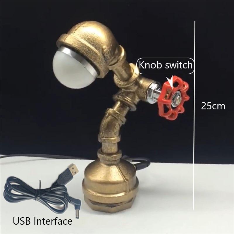 Bronze steampunk lamp with dome shade, knob switch, USB cable, and power plug.