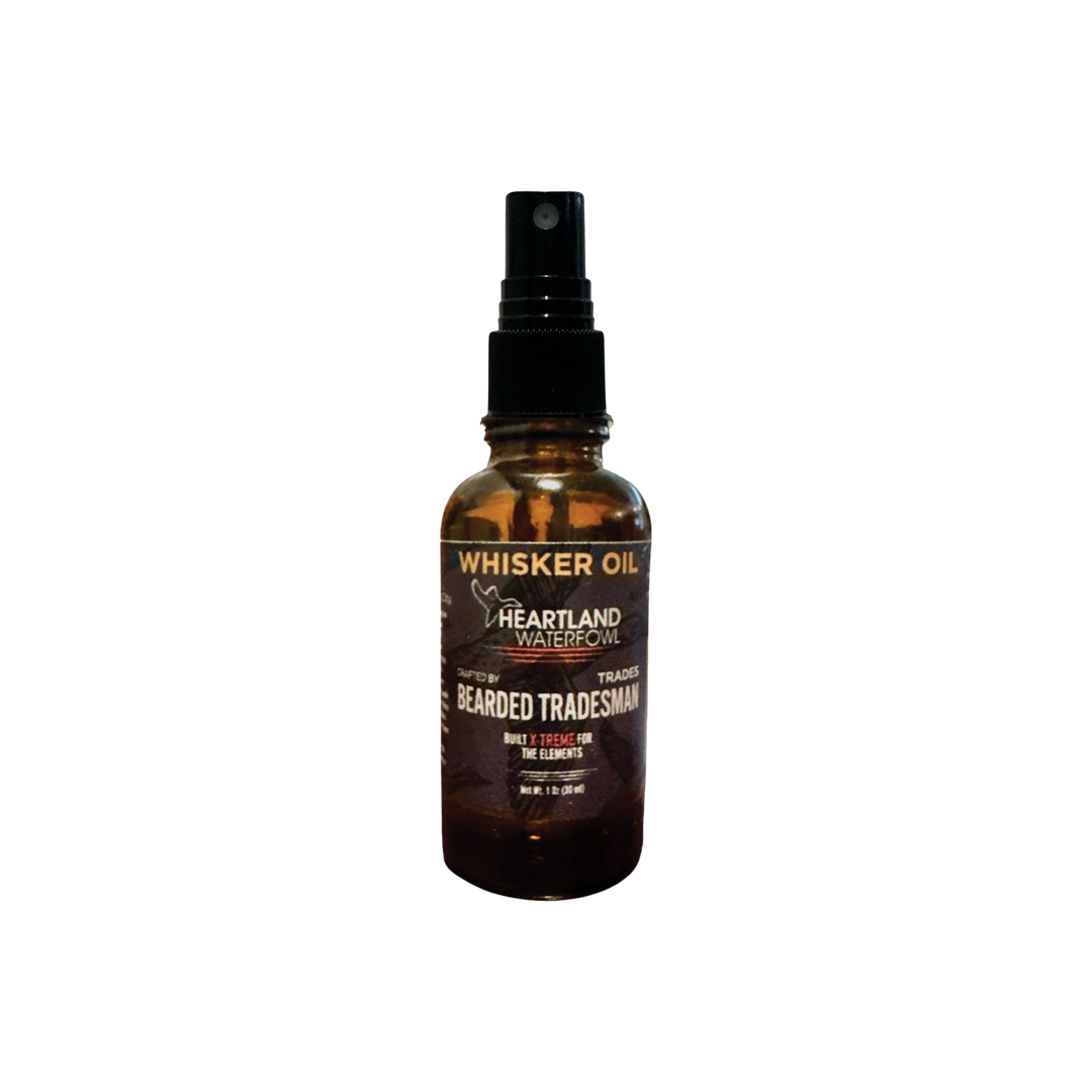 Whisker oil spray bottle with amber liquid and WHISKER OIL label