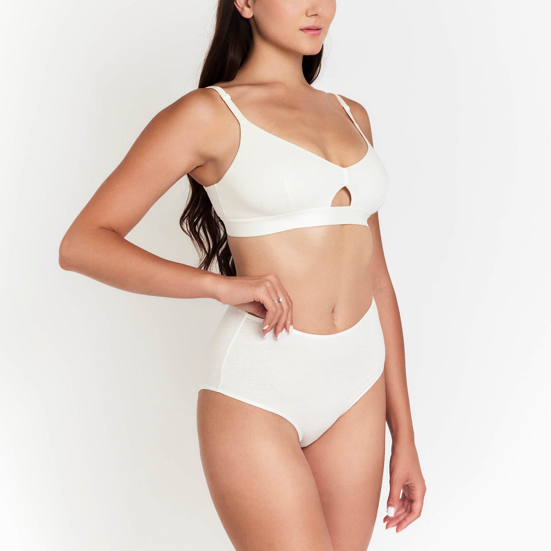 High-rise brief underwear in white with high-cut legs and soft, stretchy fabric look.