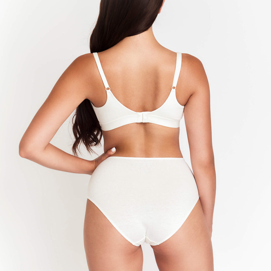 High-rise brief underwear in white, back view with high waist and minimal seam lines.