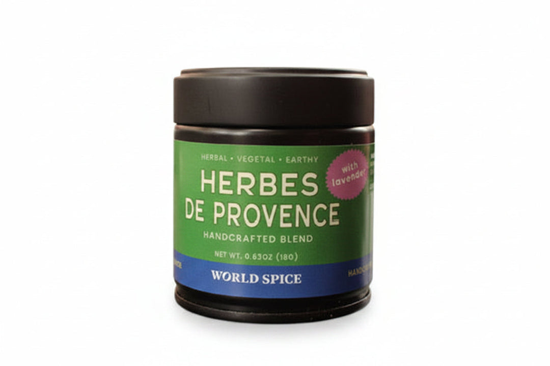 Herbes de Provence spice jar with black lid and green World Spice label.