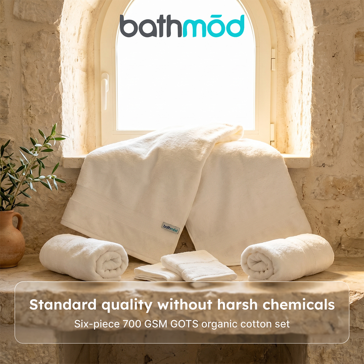 Bathmood white towel set with six neatly folded towels stacked for display
