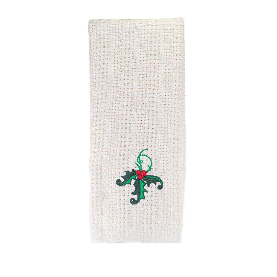 Off-white cotton kitchen towel with green-and-black fleur-de-lis embroidery